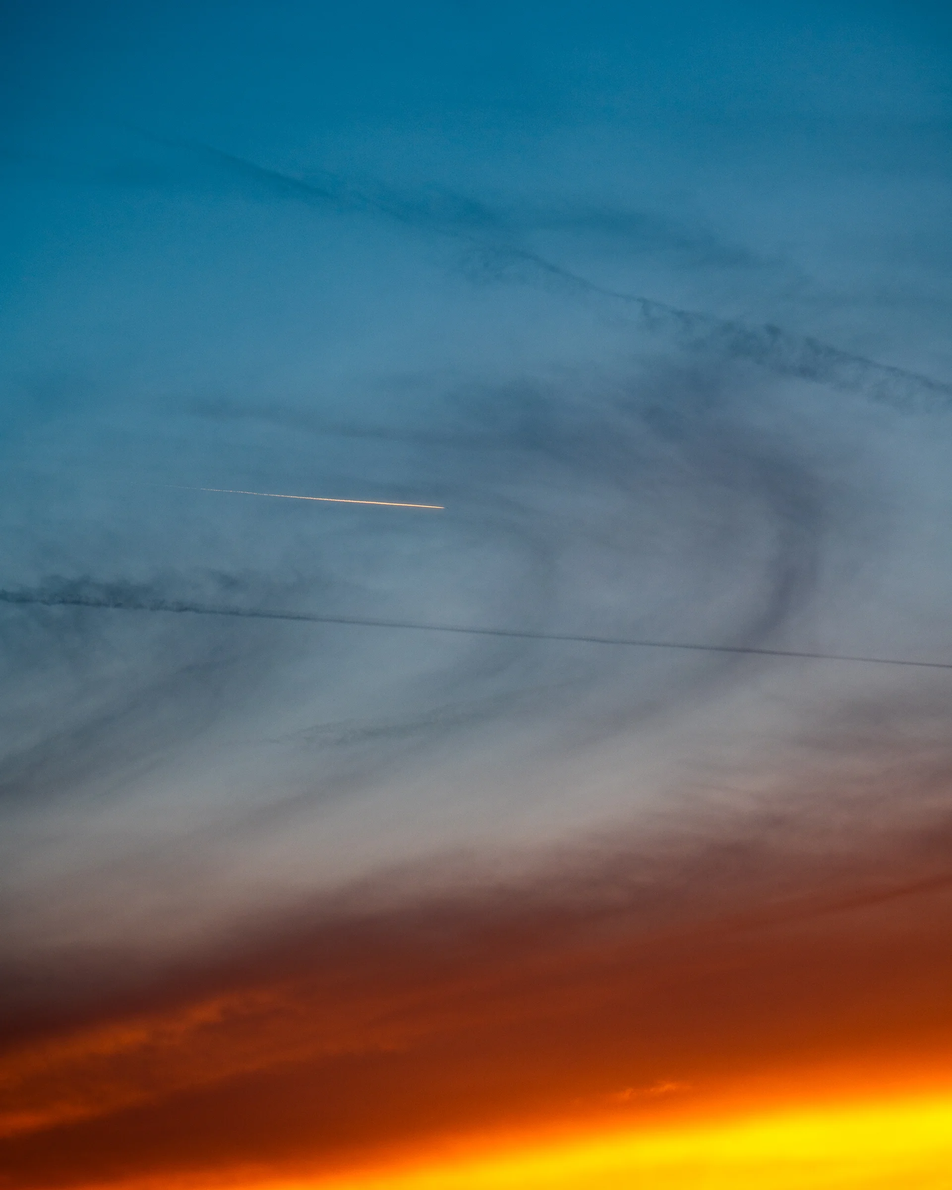 Jet Contrail in the Sunset Sky